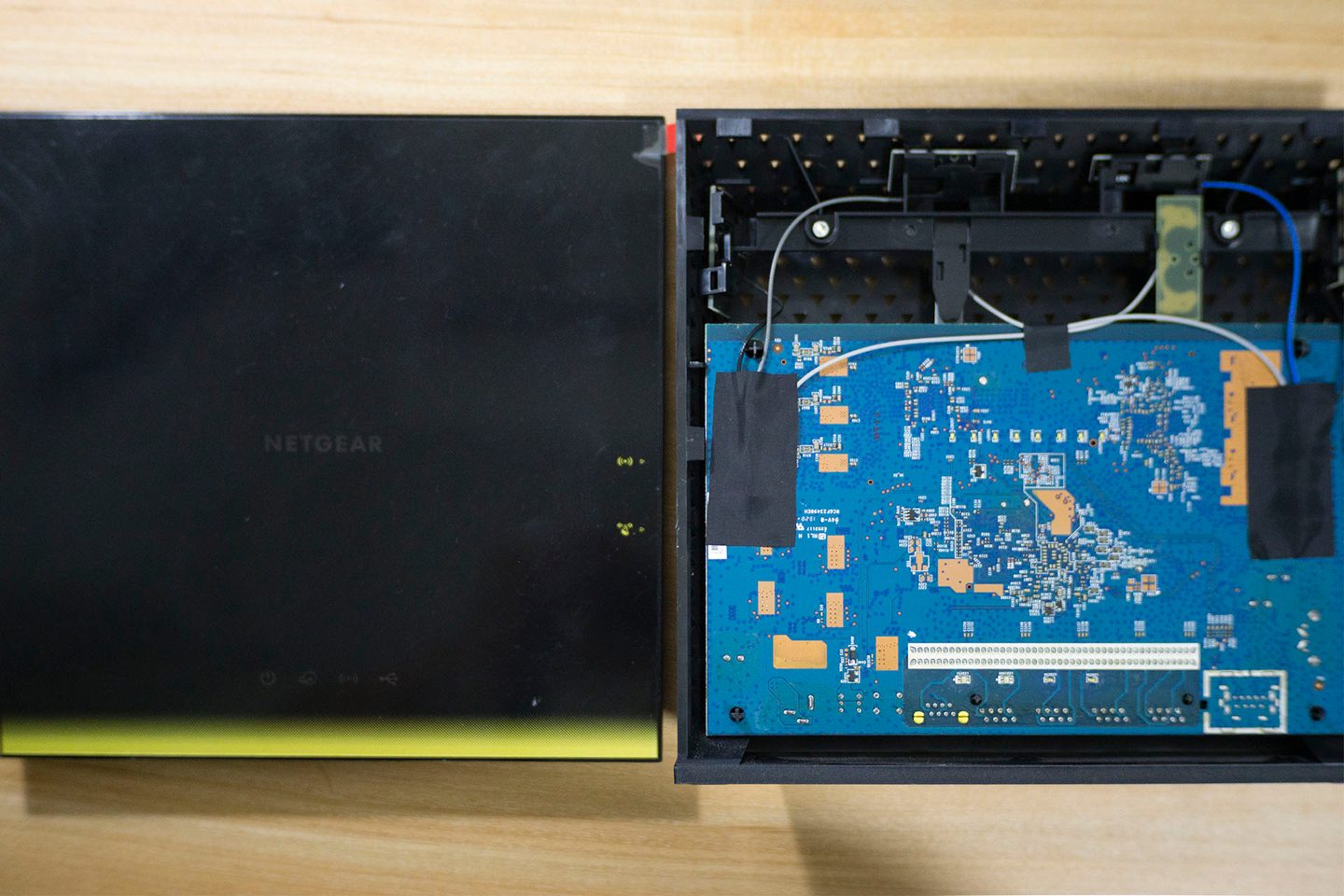 Once the panel is removed, you can see the router's circuit board.